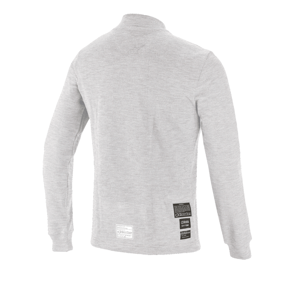 Alpinestars Race V3 Long Sleeve Top, couche de base pour le sport automobile, blanc, vue arrière montrant les étiquettes d'homologation FIA 8856-2018 sur le bas du dos, matériau résistant aux flammes à texture douce pour la protection en sport automobile
