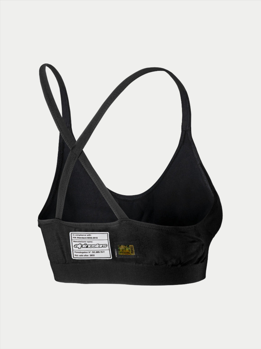 Soutien-gorge Alpinestars Stella TECH ZX, sous-vêtement de course automobile, noir, vue arrière avec étiquette de certification FIA 8856-2018, fines bretelles croisées, matériau léger et ignifuge pour la protection en sport automobile.