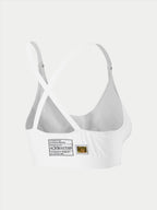 Alpinestars Stella TECH ZX Bra, witte vlamvertragende race-onderkleding, achteraanzicht met gekruiste rugbanden, voorzien van FIA 8856-2018 homologatielabel en hologram, lichtgewicht performance basislaag voor dames