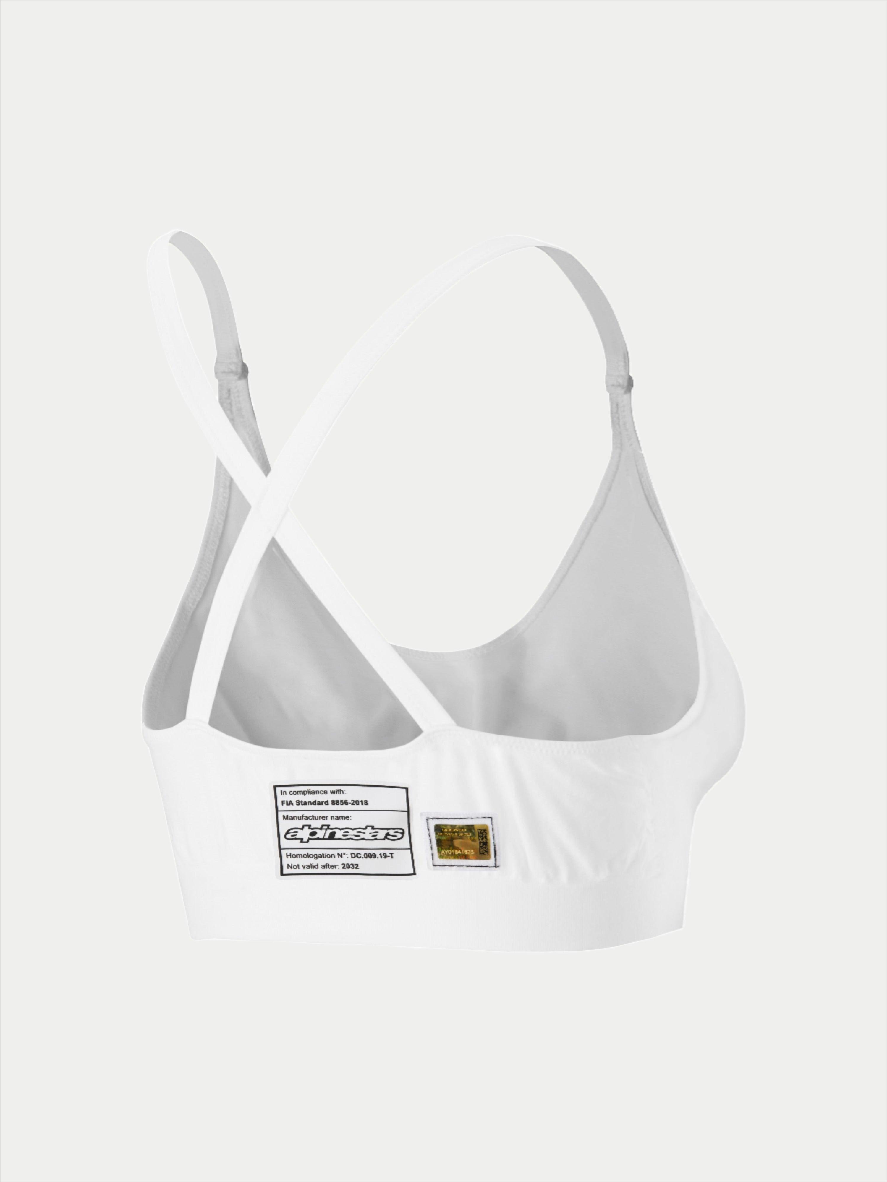 Alpinestars Stella TECH ZX Bra, witte vlamvertragende race-onderkleding, achteraanzicht met gekruiste rugbanden, voorzien van FIA 8856-2018 homologatielabel en hologram, lichtgewicht performance basislaag voor dames