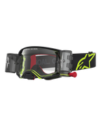 Alpinestars Supertech Firma Roll Off Veiligheidsbril, motorcrossbril in zwart en geel fluo met helder vizier en roll-off systeem voor off-road racing.