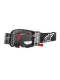 Masque Alpinestars Supertech Corp Roll-Off, monture noire et écran clair, doté d'un système Wide Vision Roll-Off avec tirette rouge, bandeau noir arborant un large logo Alpinestars gris et blanc, lunettes techniques de motocross avec slogan « One Goal. One Vision. ».