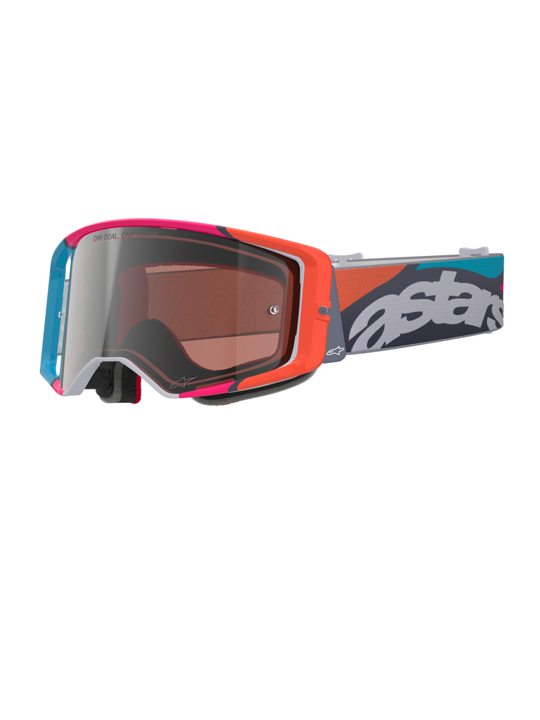 Alpinestars Supertech Stream Goggles, Gray frame with vibrant red and blue accents, Multi Mirror Silver lens, thick foam padding, adjustable strap with bold white 'astars' branding and colorful geometric patterns, professional motocross eye protection.