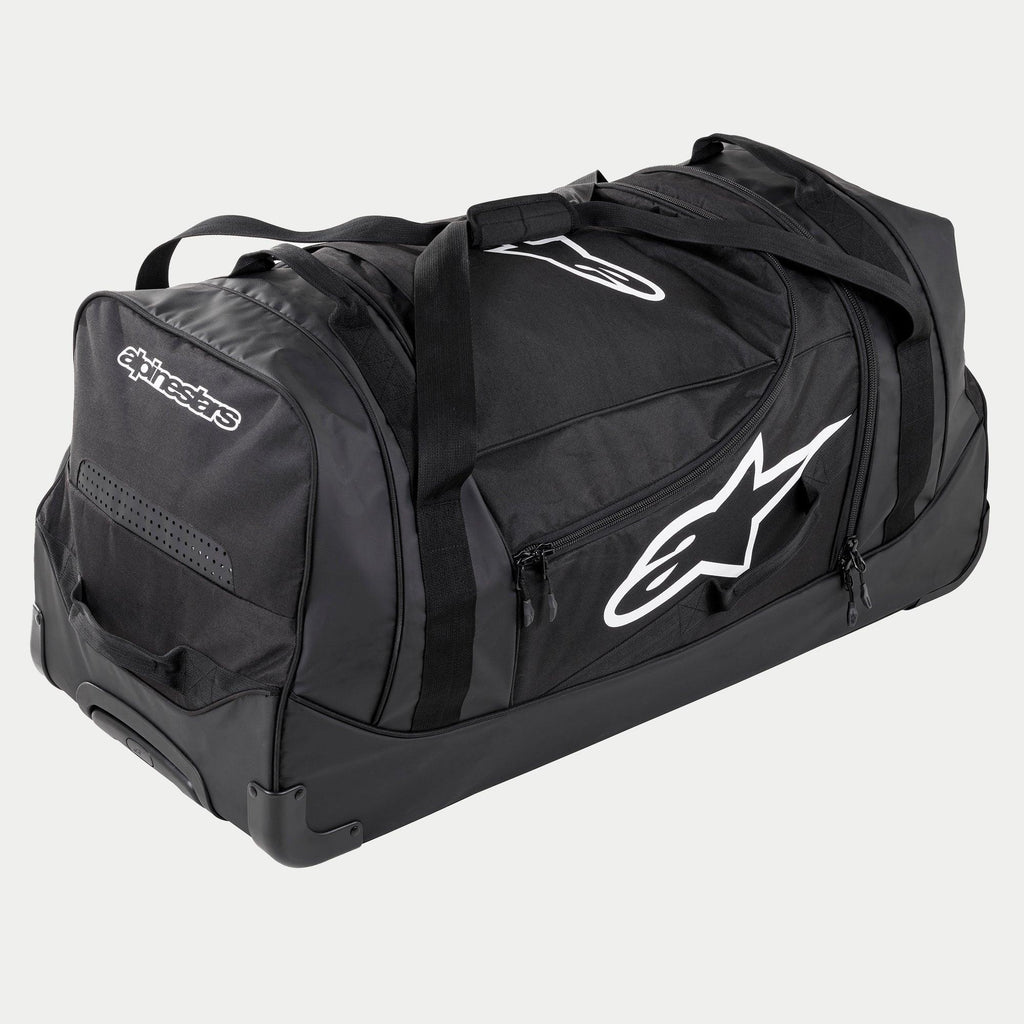 Alpinestars Komodo Reisetasche, große Motocross-Ausrüstungstasche in Schwarz und Anthrazit mit weißen Logos, ausgestattet mit Rollen und einem Teleskopgriff, strapazierfähige Konstruktion für den Transport von Rennausrüstung