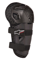 Alpinestars Bionic Action Kickstart kniebeschermer, jeugd motorcross knie- en scheenbeschermer, zwart, met gearticuleerde plastic schaal, dubbele elastische bandsluiting met wit logo en rode Kickstart-branding, gewatteerde mesh-achterkant voor off-road bescherming