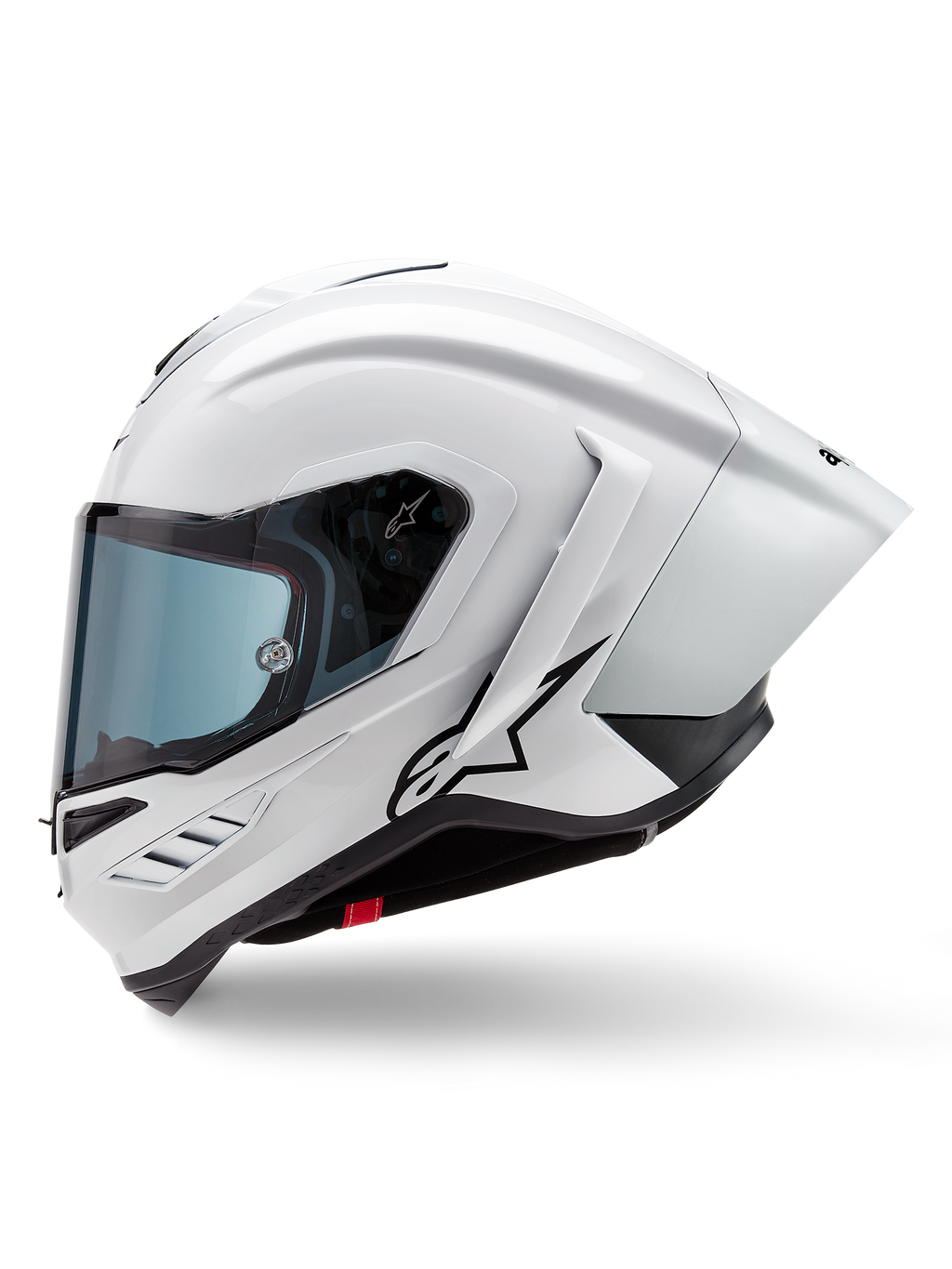 Casque Alpinestars Supertech R10 Solid, casque intégral de course, blanc brillant et noir mat, vue de profil avec spoiler aérodynamique intégré, visière teintée et logo étoile Alpinestars noir