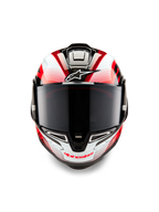 Alpinestars Supertech R10 Team Helm, vooraanzicht, glanzend zwart carbon met rood en wit, met een donker getint vizier, wit Astar-logo op het voorhoofd, rode Alpinestars-branding op de kinbeschermer, aerodynamisch race-ontwerp met gedetailleerde graphics