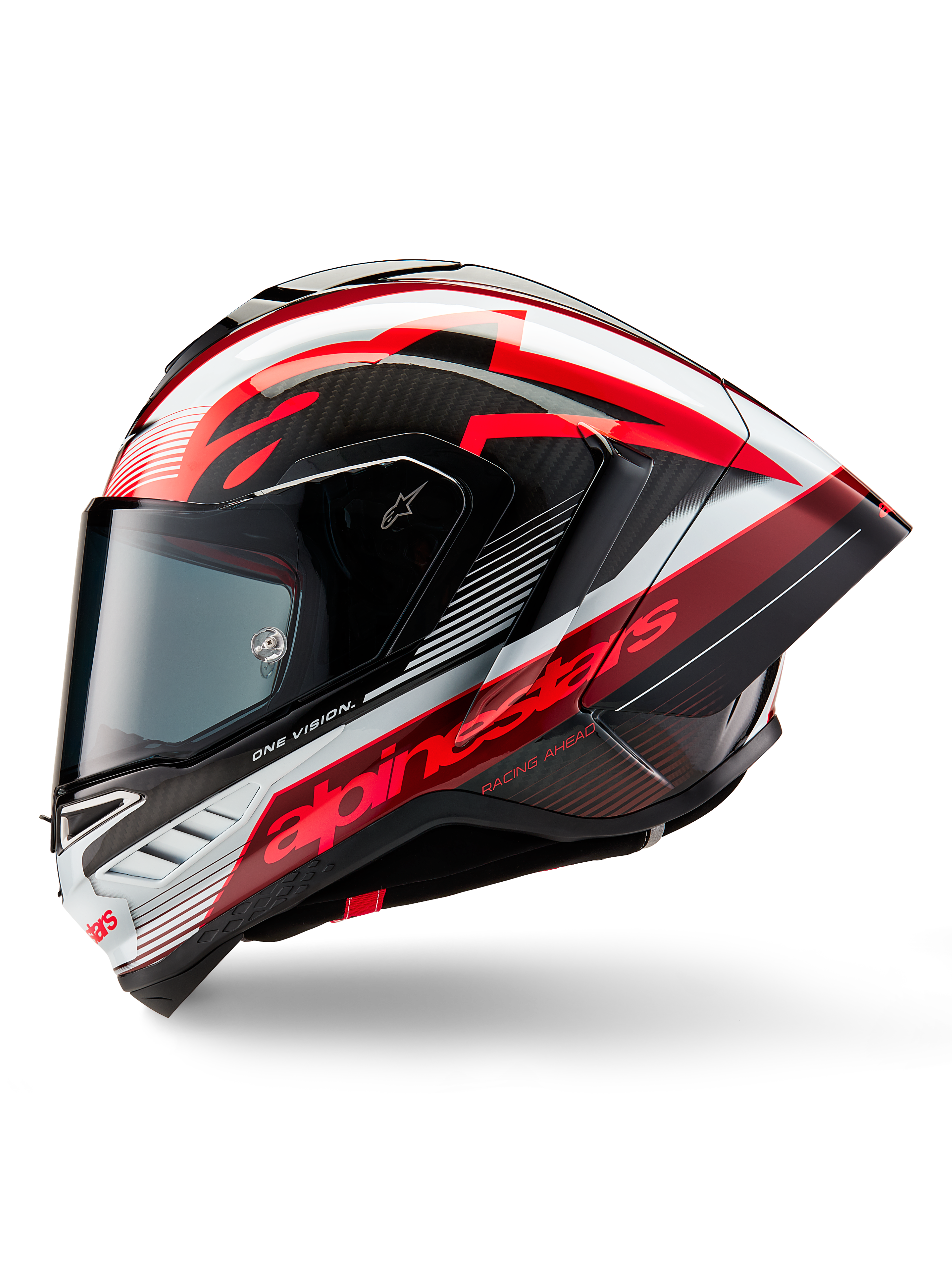 Alpinestars Supertech R10 Team Helm, integraal motorracehelm, glanzende afwerking in zwart carbon, rood en wit, zijprofiel met aerodynamisch ontwerp, opvallende rode branding met 'One Vision' en 'Racing Ahead' tekst, strakke koolstofvezelconstructie voor professionele prestaties.