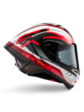 Alpinestars Supertech R10 Team helm, motorracehelm, zwart carbon met rode en witte glanzende graphics, aerodynamisch profielaanzicht met een donker vizier, carbonfiber details en opvallende rode branding, hoogwaardige race-uitrusting