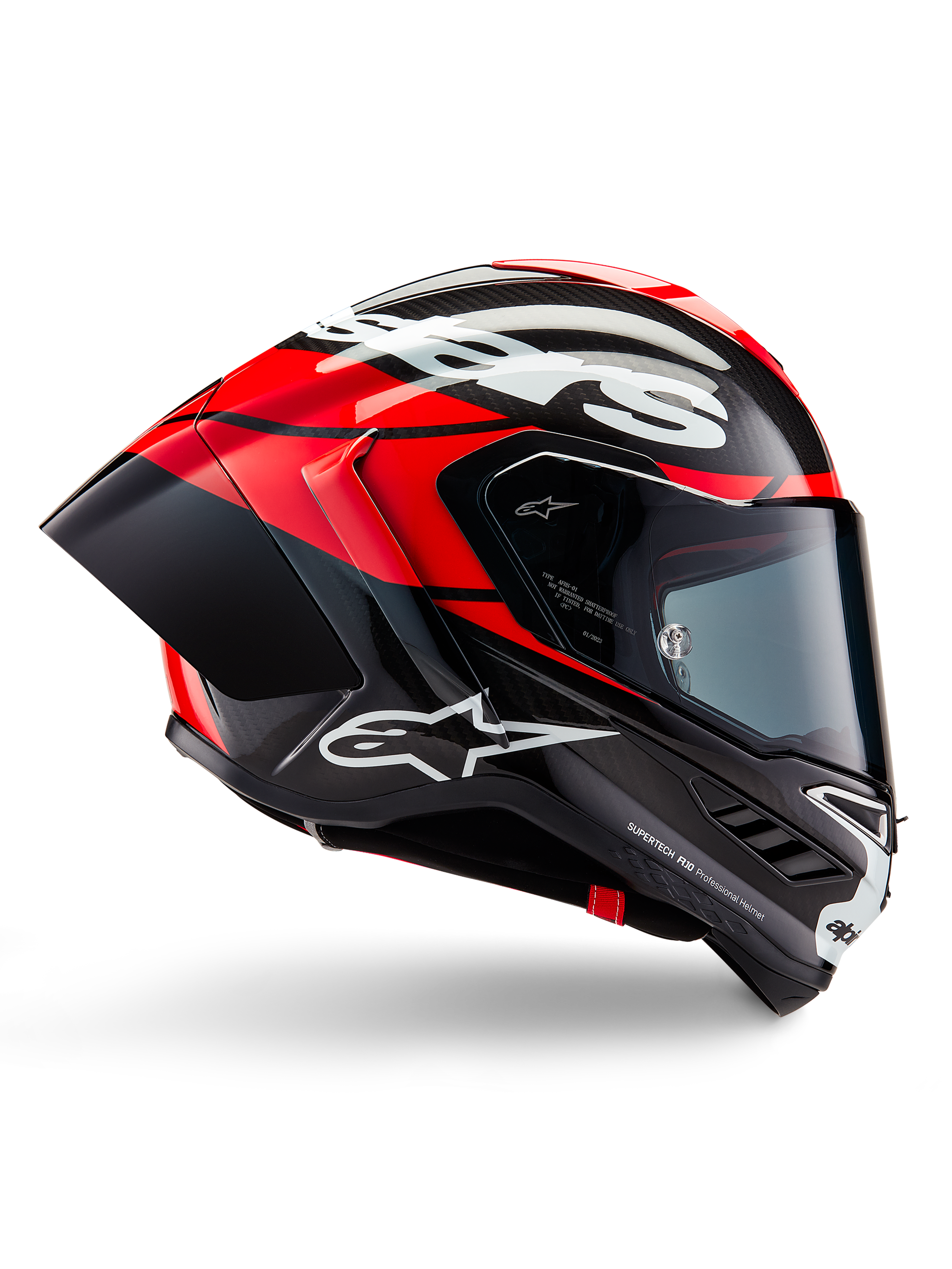 Casque Alpinestars Supertech R10 Element, casque de moto intégral de course, carbone noir avec accents rouge vif et blancs, profil latéral montrant la coque aérodynamique en fibre de carbone, finition brillante avec logo blanc, visière teintée, protection de course professionnelle