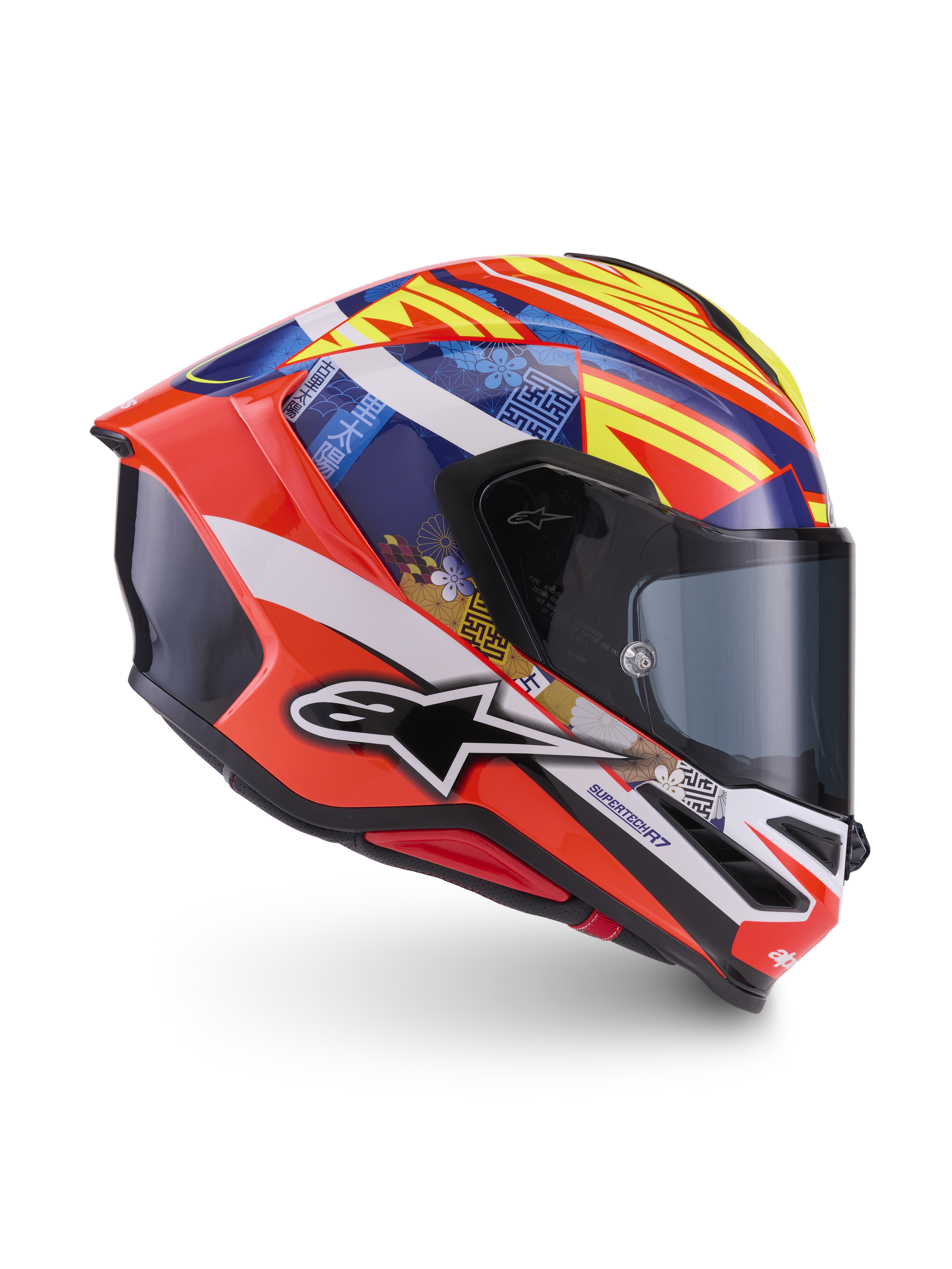 Alpinestars S-R7 Taiyo Furusato Helmet, ECE 22.06 certified full face motorcycle racing helmet, Red, White, Blue, and Yellow, featuring multi-composite carbon shell construction and graphic design