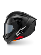 Alpinestars S-R7 Solid Helm, Integralhelm, Schwarz Glänzend, linke Seitenansicht mit weißem Alpinestars-Logo, aerodynamische Schale mit integriertem Spoiler, getöntes Visier und rote Notentriegelungs-Akzente.