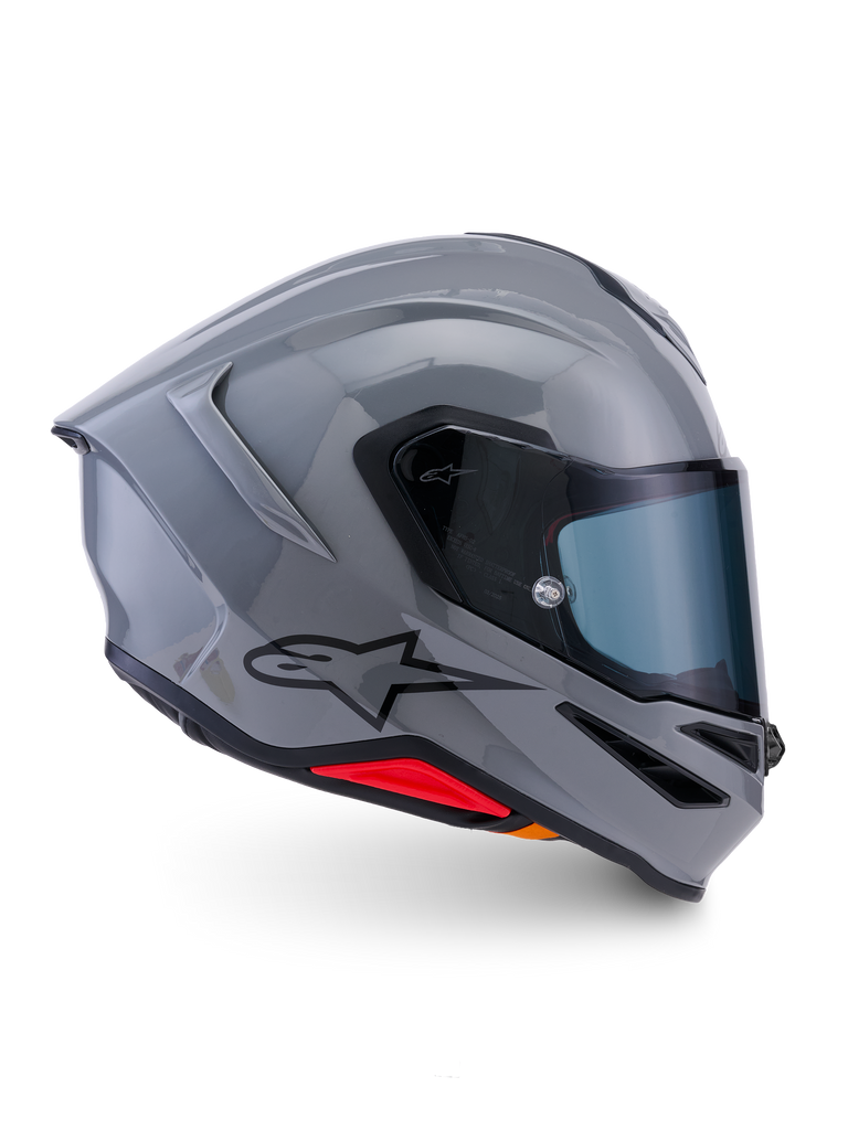 Alpinestars S-R7 Solid Helmet, Full-Face Motorcycle Helmet, Gray Glossy, side profile view, glossy gray aerodynamic shell with black logo and red base accents, high-performance racing and sport riding gear