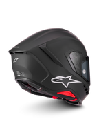 Alpinestars Supertech R7 Solid Helm, matte zwarte motorhelm met wit Astar-logo en rode interieurdetails, CE- en DOT-gecertificeerde circuit- en weghelm, driekwart weergave