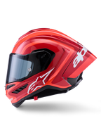 Casque Alpinestars Supertech R10 Arius, casque de course intégral, rouge brillant avec graphismes de logo blancs, vue de profil soulignant le spoiler aérodynamique et la visière transparente, coque en composite de fibre de carbone pour le sport motocycliste professionnel