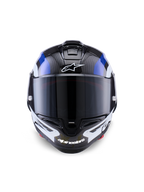 Casque Alpinestars Supertech R10 Arius, casque intégral de course, noir blanc et bleu brillant, vue de face avec visière fumée foncée, texture en fibre de carbone visible sur la calotte supérieure, logos Alpinestars blancs sur le front et la mentonnière, design aérodynamique épuré pour la compétition professionnelle