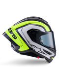 Casque Alpinestars Supertech R10 Arius, casque intégral de course, noir, argent et jaune fluo brillant, vue de profil montrant la coque aérodynamique et l'écran fumé foncé, construction en fibre de carbone avec marquage distinctif