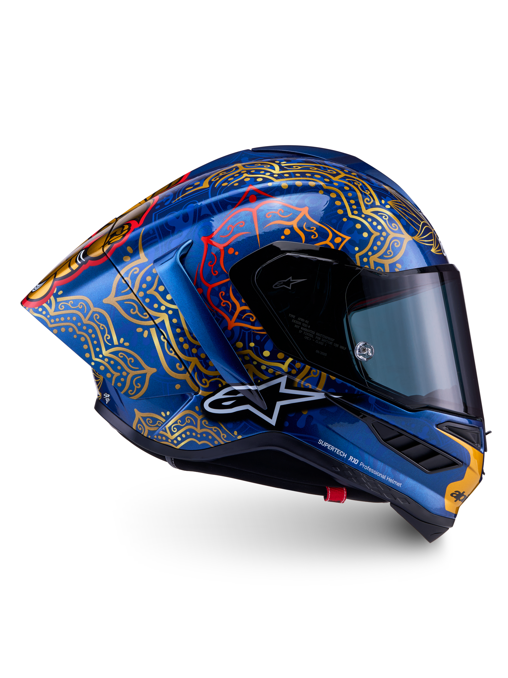 Casque Alpinestars Supertech R10 Martinator Thai en carbone bleu brillant, mandalas dorés complexes et profil de course.