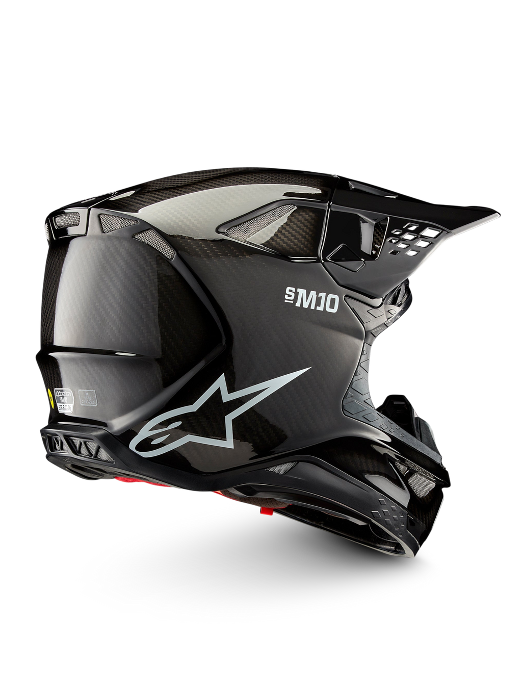 Alpinestars Supertech M10 Solid helm ECE 22.06, zwarte glanzende carbon motocrosshelm in zijaanzicht met ventilatiepoorten en peakvizier, CE-gecertificeerd