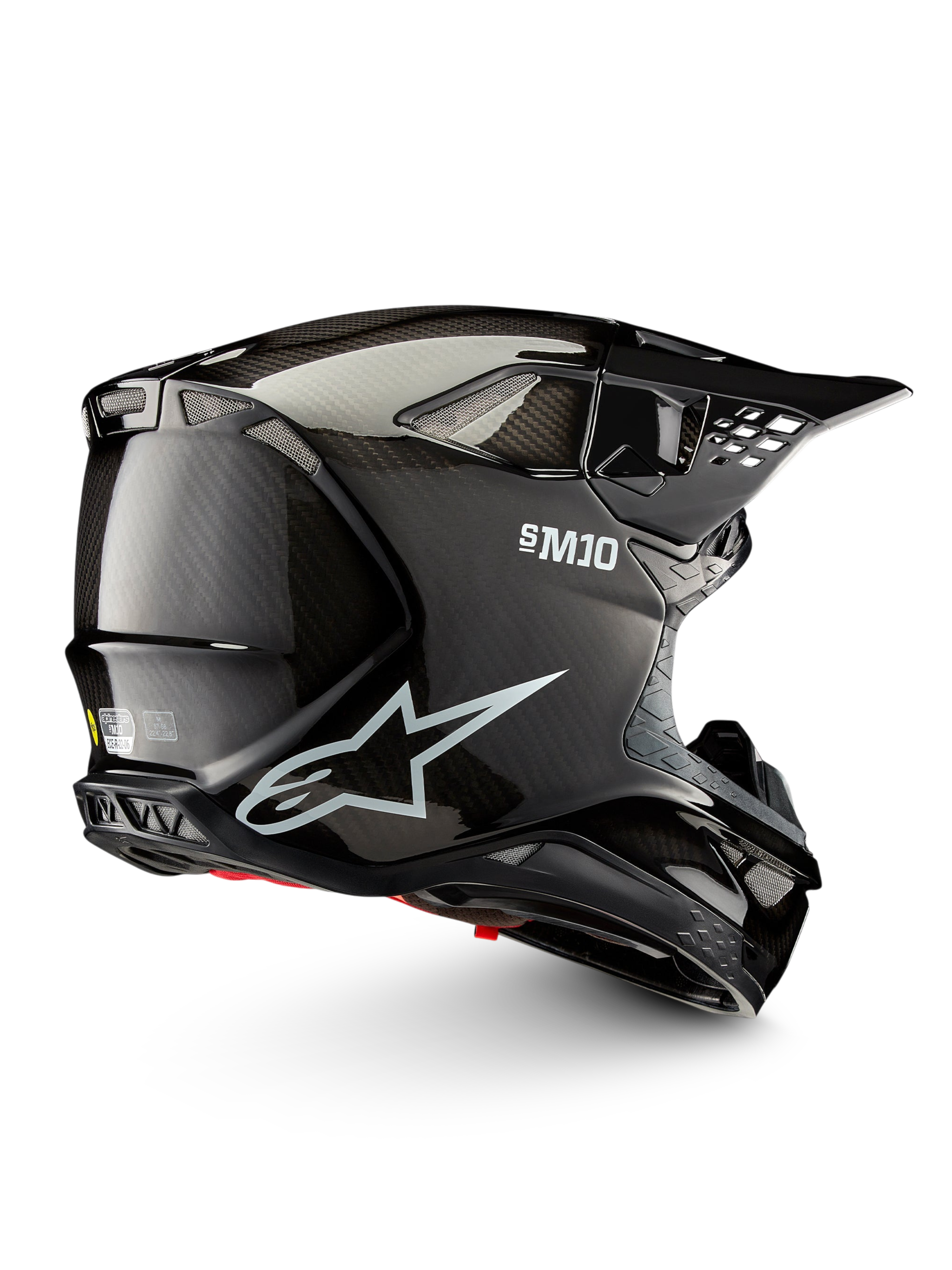 Alpinestars Supertech M10 Solid helm ECE 22.06, zwarte glanzende carbon motocrosshelm in zijaanzicht met ventilatiepoorten en peakvizier, CE-gecertificeerd