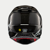 Casque Alpinestars Supertech M10 Solid, carbone noir brillant, vue arrière montrant le tissage en fibre de carbone brillant, logo Alpinestars blanc, autocollants de certification MIPS et ECE, forme aérodynamique avec ports de ventilation