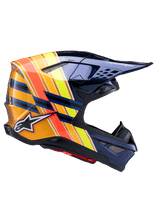 Alpinestars Supertech M10 TLD Edition 25 helm, motorcrosshelm, donker metallic blauw met levendige oranje, gele en rode strepen, zijaanzicht, glanzende afwerking met Alpinestars en Troy Lee Designs branding, aerodynamische schaal met meerdere mesh-ventilatieopeningen voor off-road racen