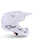 Alpinestars S-M3 Solid helm, motorcrosshelm, glanzend wit, zijaanzicht met zwart sterlogo, hoekige aerodynamische schaal, meerdere ventilatieopeningen, geïntegreerd vizier en kinbeschermer, off-road racebescherming