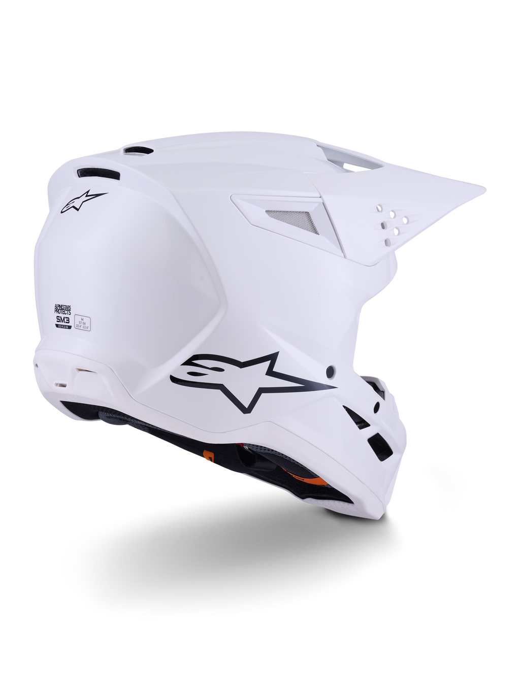 Alpinestars S-M3 Solid Helm, motorcrosshelm, glanzend wit, driekwart achteraanzicht met zwart Alpinestars-logo, ventilatieopeningen en aerodynamisch schaalontwerp voor off-road racing.