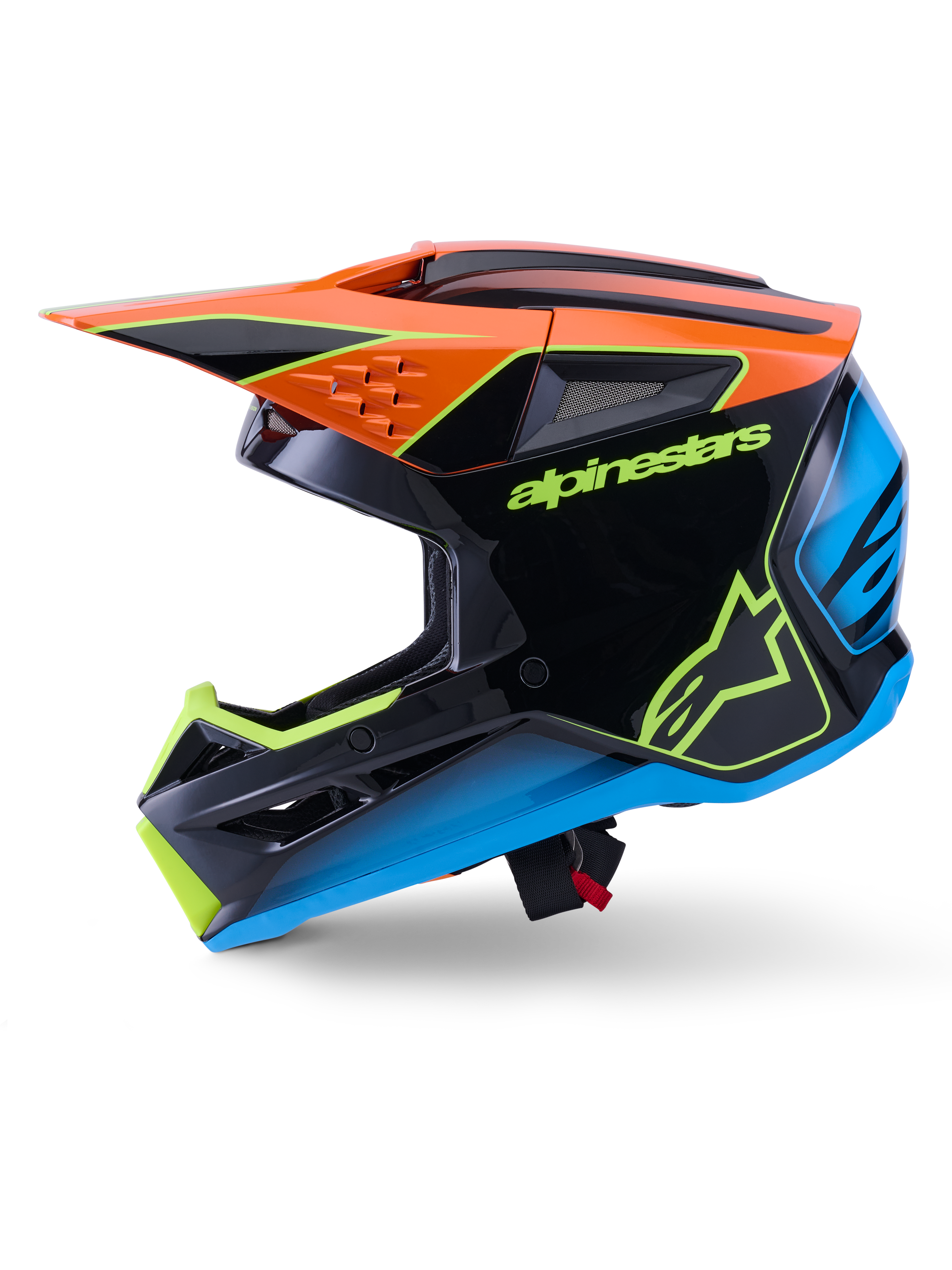 Alpinestars S-M3 Fray helm ECE 22.06, motorcrosshelm, zwart met oranje, blauwe en fluorescerend gele accenten, zijaanzicht met aerodynamische schaal en geïntegreerde ventilatieopeningen, voorzien van opvallende Alpinestars-branding, professionele off-road racebescherming