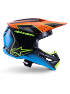 Alpinestars S-M3 Fray Helm ECE 22.06, motorcrosshelm, zwart, oranje, blauw en neongeel, zijprofiel van een glanzende aerodynamische schaal met een opvallende oranje klep, neongroene branding en blauwe accenten, off-road racebescherming