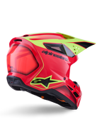 Alpinestars S-M3 Fray helm ECE 22.06, motorcrosshelm, rood, fluogeel en glanzend zwart, driekwart achteraanzicht met een gestroomlijnde aerodynamische schaal, meerdere ventilatieopeningen, neongele graphics en opvallend zwart Alpinestars-logo.