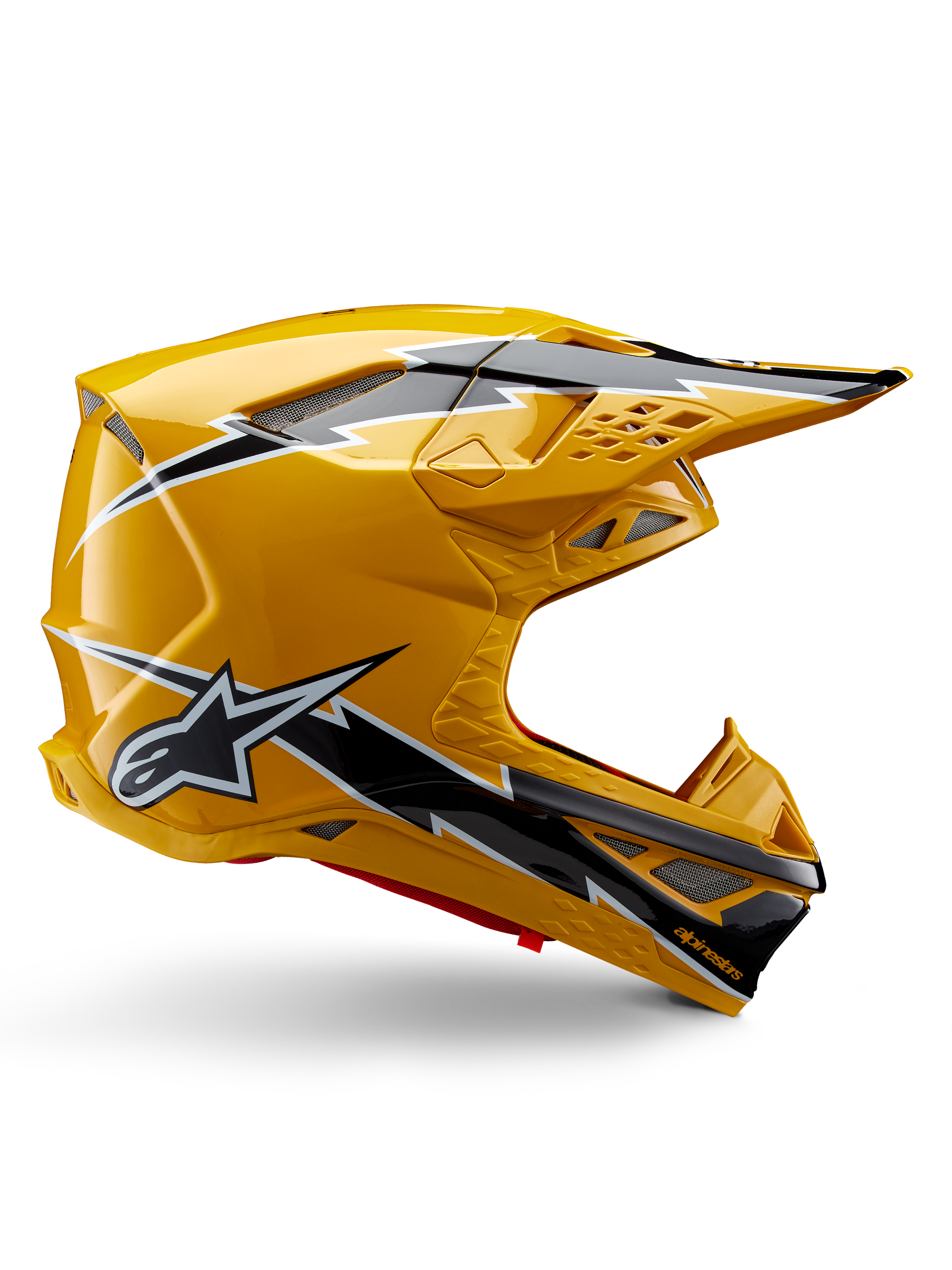 Alpinestars Supertech M10 Ampress Helmet, Motocross Helmet, Black and Yellow Glossy, side profile showing bold black and white lightning graphics, Alpinestars star logo, aerodynamic design with integrated ventilation ports and adjustable visor.