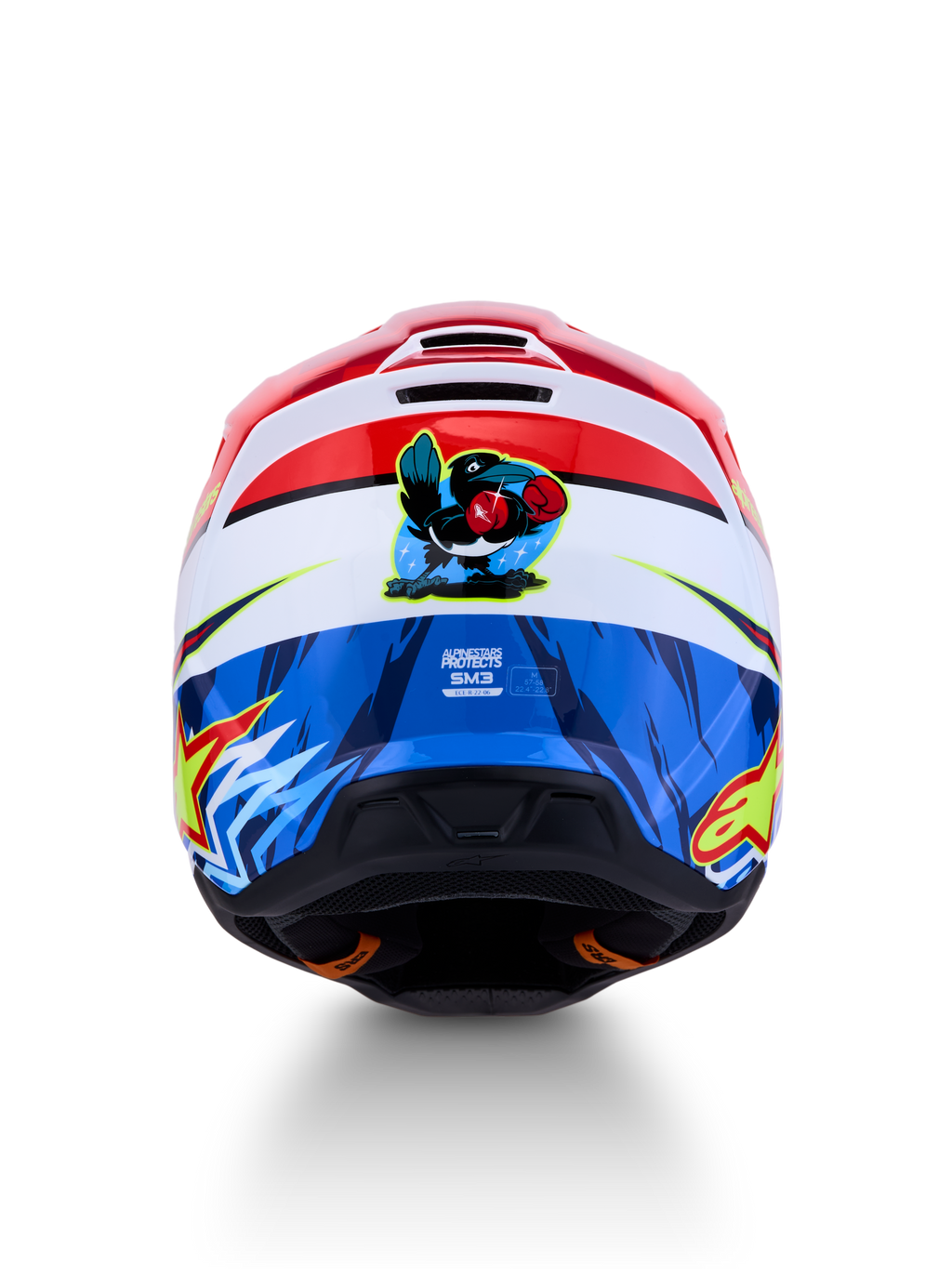 Alpinestars SM3 Falcon helm ECE06, rood en blauwe motorcrosshelm met een cartoon valk-graphic op de achterkant.