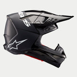 Alpinestars Supertech M10 Flood Helmet ECE, casque de motocross, noir et gris foncé avec finition mate et brillante, vue de profil présentant un design aérodynamique, une visière intégrée et le logo Alpinestars blanc