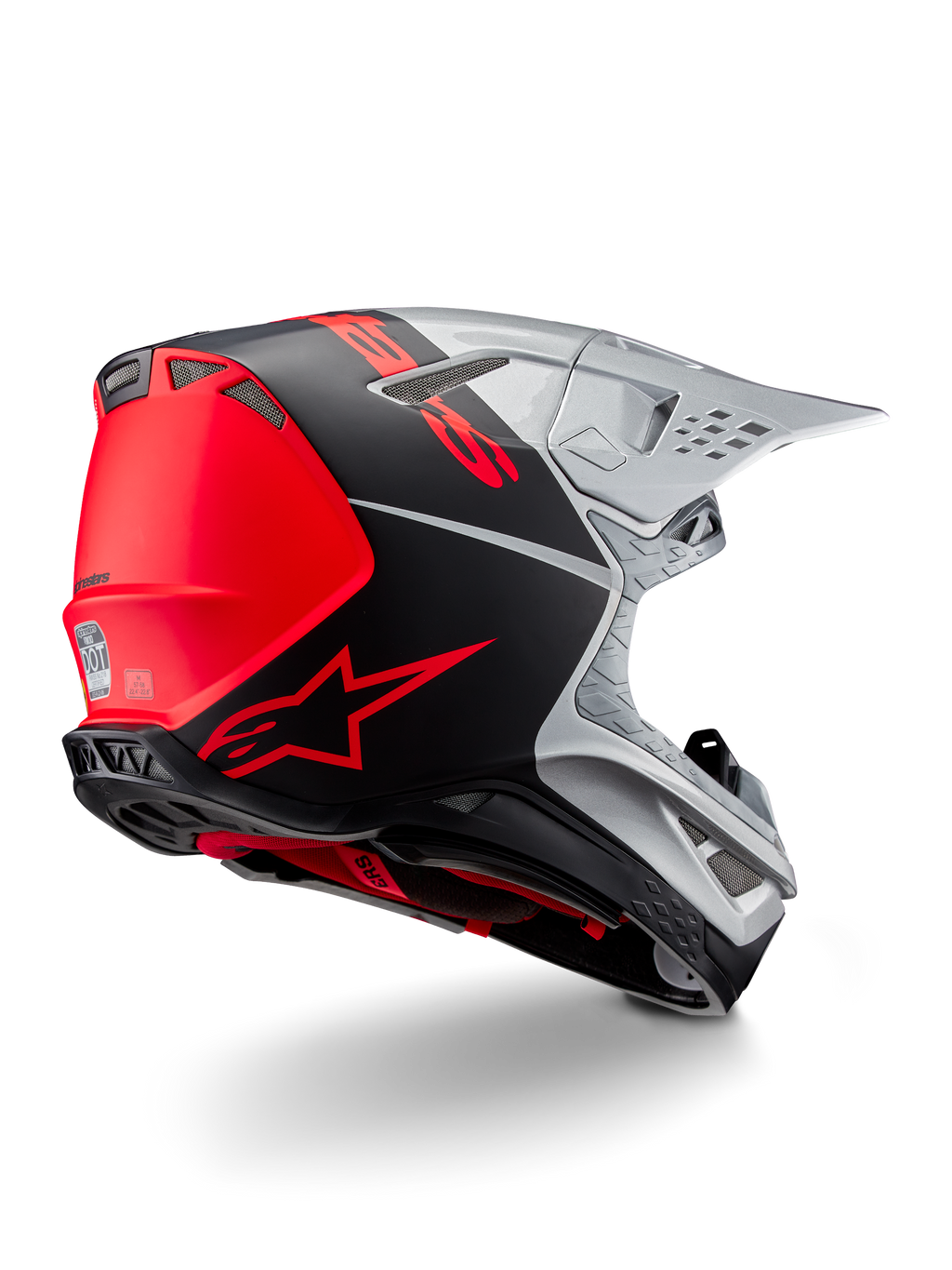 Casque Alpinestars Supertech M10 Flood ECE 22.06, casque de motocross, argent, noir et orange fluo, vue arrière-latérale mettant en avant le design aérodynamique de la coque, les ports de ventilation et la finition mate et brillante