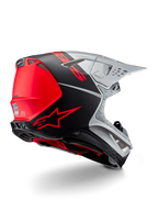 Casque Alpinestars Supertech M10 Flood ECE 22.06, casque de motocross, argent, noir et orange fluo, vue arrière-latérale mettant en avant le design aérodynamique de la coque, les ports de ventilation et la finition mate et brillante