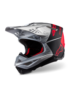 Casque Alpinestars Supertech M10 Flood ECE 22.06, casque de motocross, argenté, noir et orange fluo, finitions mates et brillantes, doté d'une coque en carbone profilée avec logo Alpinestars et de multiples orifices de ventilation