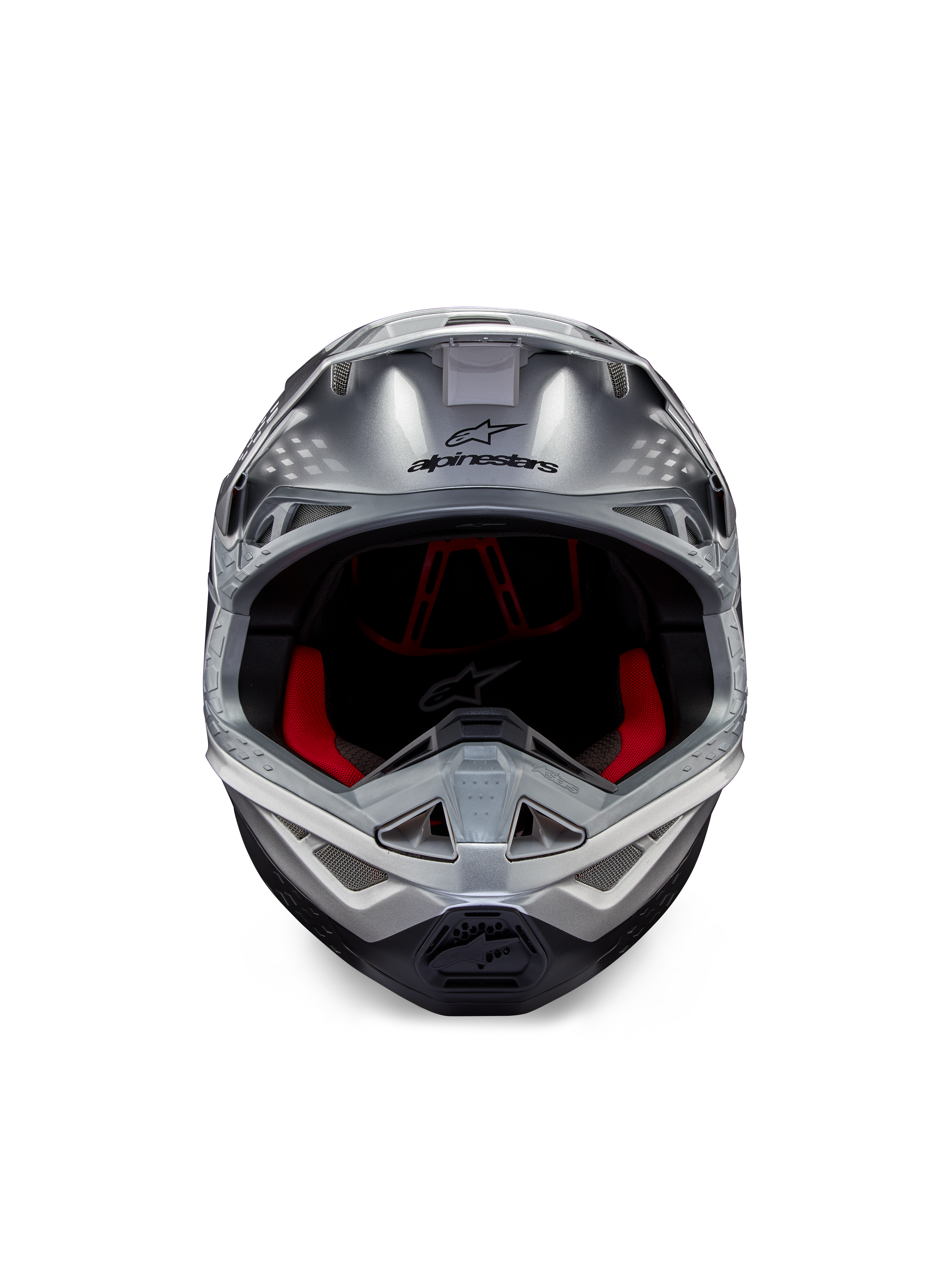 Casque Alpinestars Supertech M10 Flood ECE 22.06, casque de motocross, argenté, noir et orange fluo, vue de face présentant une coque aérodynamique, une large ouverture faciale avec rembourrage intérieur rouge, logo Alpinestars noir et mentonnière ventilée pour la course tout-terrain