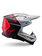 Casque Alpinestars Supertech M10 Flood ECE 22.06, casque de motocross, argent, noir et orange fluo, finitions mate et brillante, profil aérodynamique avec coque multi-composite, marquage audacieux avec logo Alpinestars orange, ports de ventilation à haut débit et visière protectrice