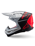 Casque Alpinestars Supertech M10 Flood, casque de motocross, argent et noir avec accents orange fluo, profil latéral, design aérodynamique épuré avec ports de ventilation, finitions mates et brillantes, protection professionnelle pour la course tout-terrain