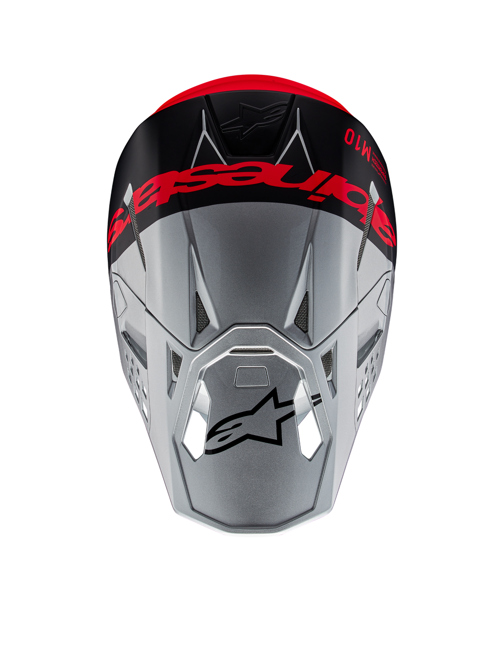Casque Alpinestars Supertech M10 Flood ECE 22.06, casque de motocross, argent et noir avec orange fluorescent, vue de dessus montrant un logo imposant sur le sommet, logo Astars noir sur la visière, profil aérodynamique épuré avec ports de ventilation, textures mates et brillantes.