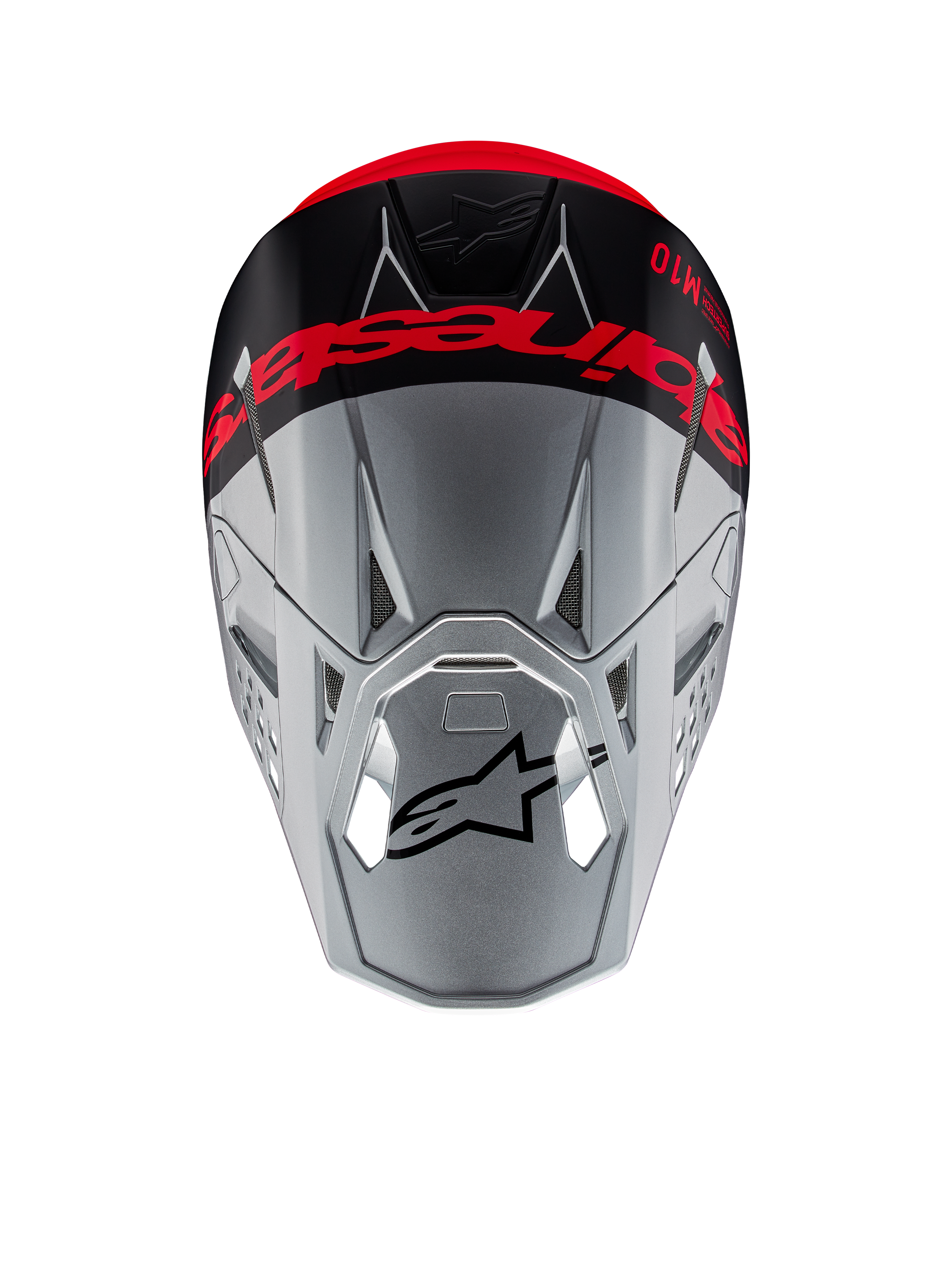 Casque Alpinestars Supertech M10 Flood ECE 22.06, casque de motocross, argent et noir avec orange fluorescent, vue de dessus montrant un logo imposant sur le sommet, logo Astars noir sur la visière, profil aérodynamique épuré avec ports de ventilation, textures mates et brillantes.