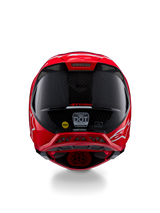 Casque Alpinestars Supertech M10 Flood ECE 22.06, vue arrière, rouge fluo mat et brillant, casque de motocross avec texture en fibre de carbone apparente, autocollants de certification MIPS et DOT, et ports de ventilation aérodynamiques.