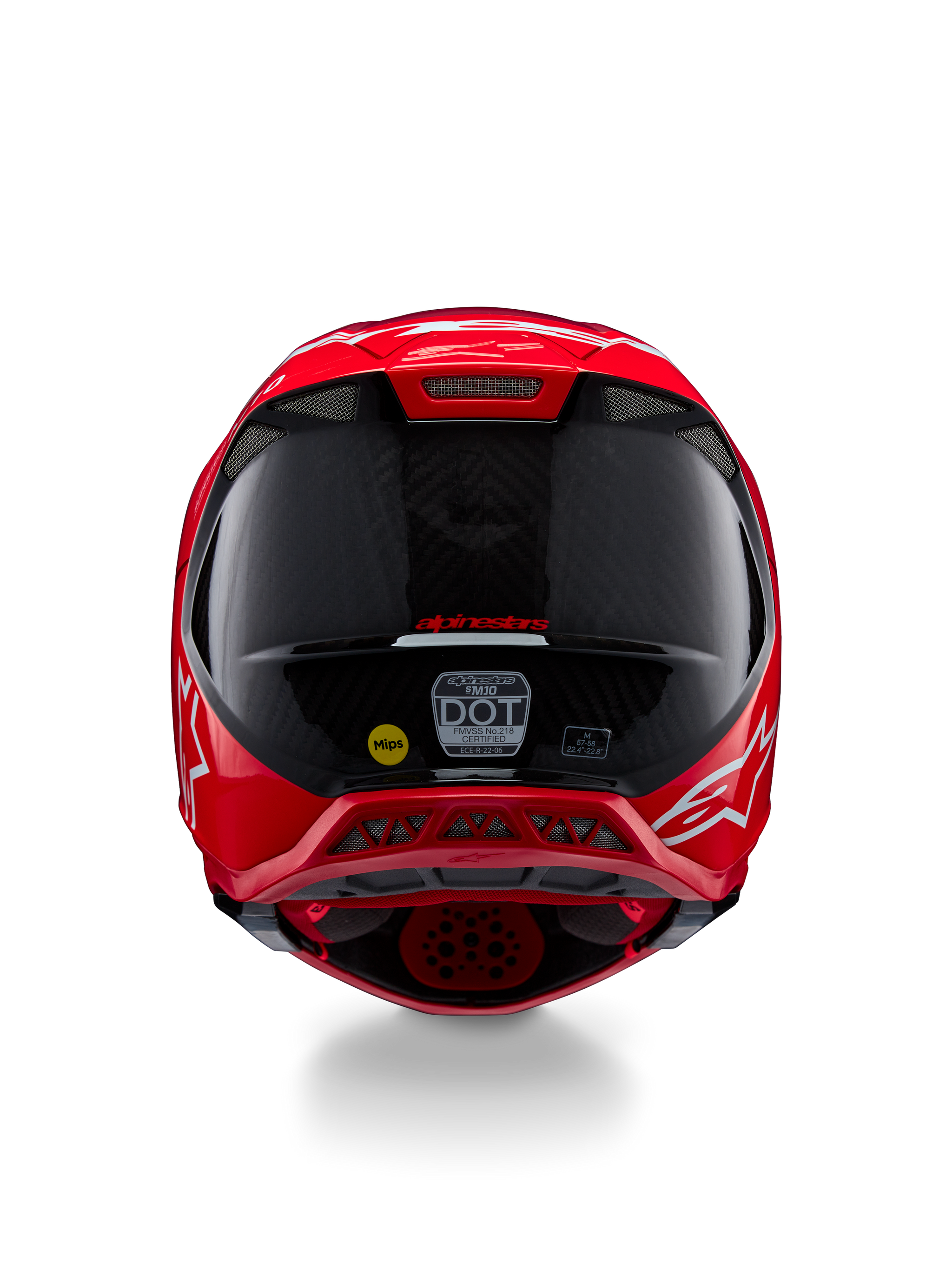 Casque Alpinestars Supertech M10 Flood ECE 22.06, vue arrière, rouge fluo mat et brillant, casque de motocross avec texture en fibre de carbone apparente, autocollants de certification MIPS et DOT, et ports de ventilation aérodynamiques.