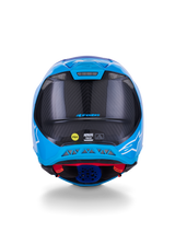 Alpinestars Supertech M10 Flood Helm, motorcrosshelm, metallic blauw en medium blauw met zwart carbon, achteraanzicht met 3K carbontextuur, witte ster-logo's, MIPS-sticker en ventilatieopeningen