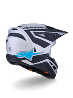 Alpinestars S-M3 Heat Helm ECE 22.06, Motocross-Helm, Silber-Blau und Schwarz Matt, Rückansicht mit großem blauen Stern-Logo und schwarzen kantigen Designs, aerodynamische Schale mit Belüftungsöffnungen, Hochleistungs-Schutz für Offroad-Rennen