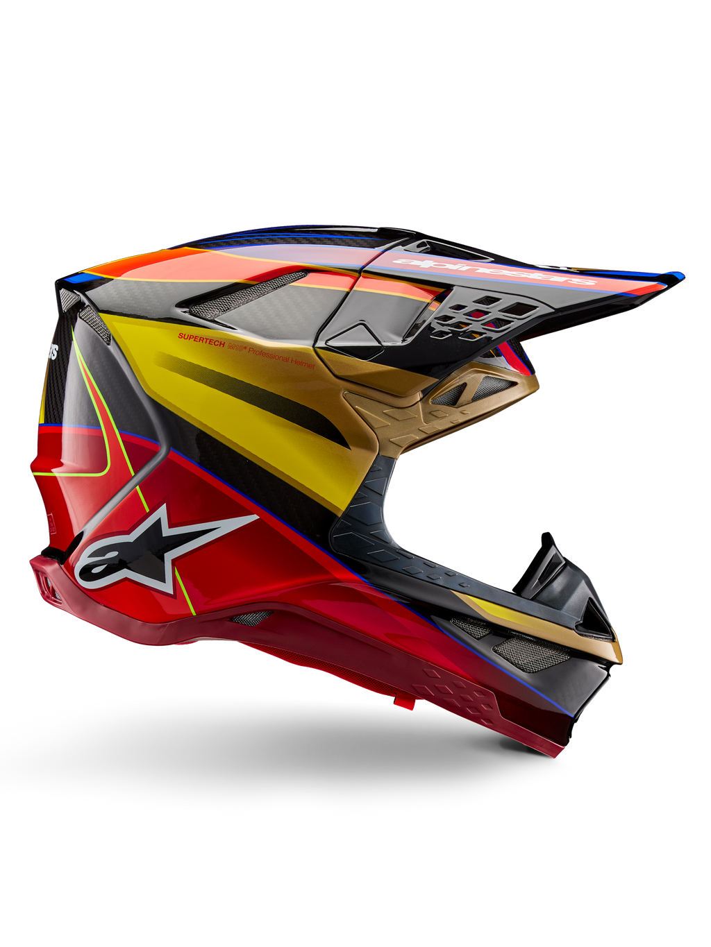 Casque Alpinestars Supertech M10 Era, casque de motocross, jaune doré et rouge Rio brillant avec accents bleus et noirs, design aérodynamique avec visière intégrée, multiples aérations avec mesh et détails en fibre de carbone, certifié ECE 22.06