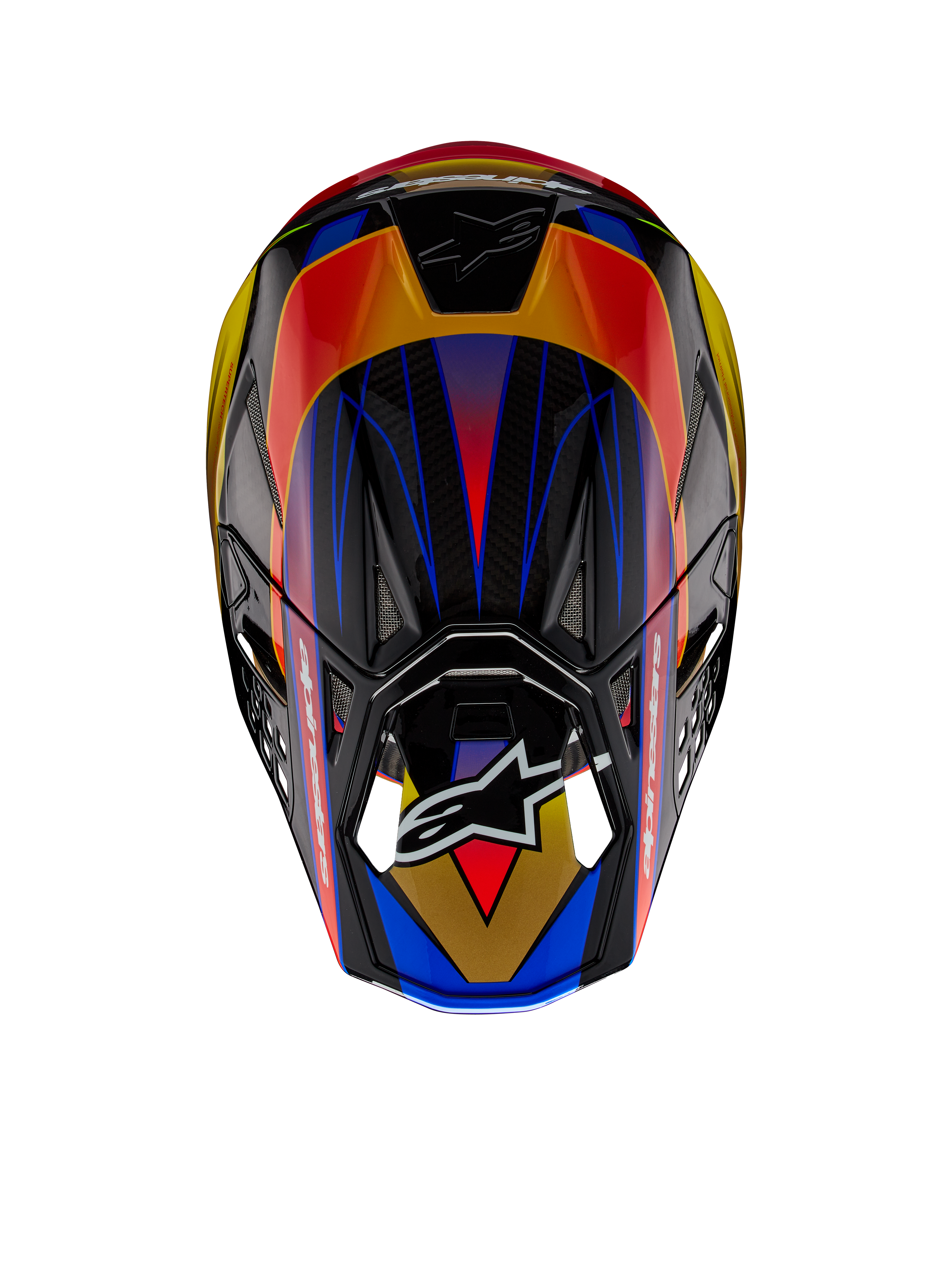 Casque Alpinestars Supertech M10 Era ECE, casque de motocross, or jaune et rouge Rio brillant, vue de dessus montrant des motifs géométriques éclatants en bleu et jaune, finition brillante avec texture de la coque en carbone visible, avec le logo Alpinestars sur la visière