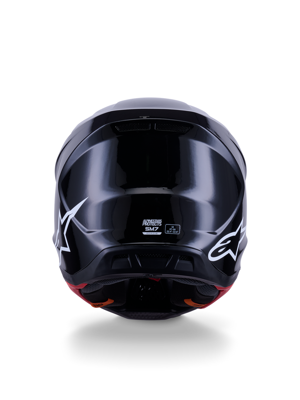 Alpinestars S-M7 Solid Helmet ECE 22.06, Motocross Helmet, Glossy Black, rear view featuring white star logos, aerodynamic composite shell with a high-shine finish, safety certification and size labels in the center