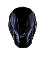Alpinestars S-M7 Solid Helmet ECE 22.06, Motocross Helmet, Glossy Black, top-down view showing aerodynamic composite shell with Astars logo and M7 branding, sleek design with ventilation ports for off-road racing performance